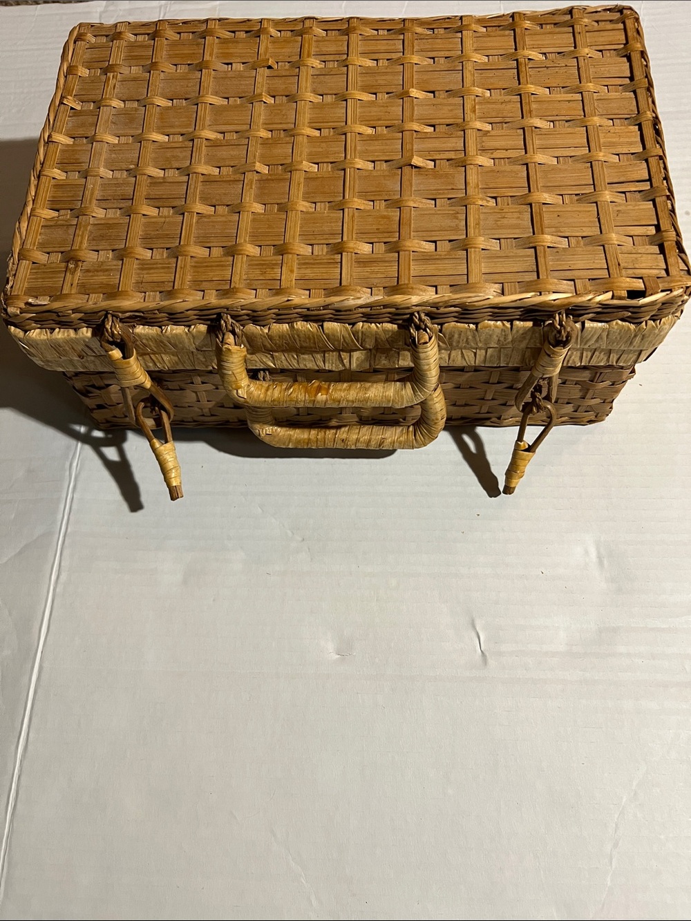 Vintage woven picnic basket in natural tan